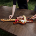 *NEW* Detailed Guitar-Shaped Acacia Wood Cheese Board With Hidden Knife Set is Perfect for Music-Themed Events or Destinations&nbsp;